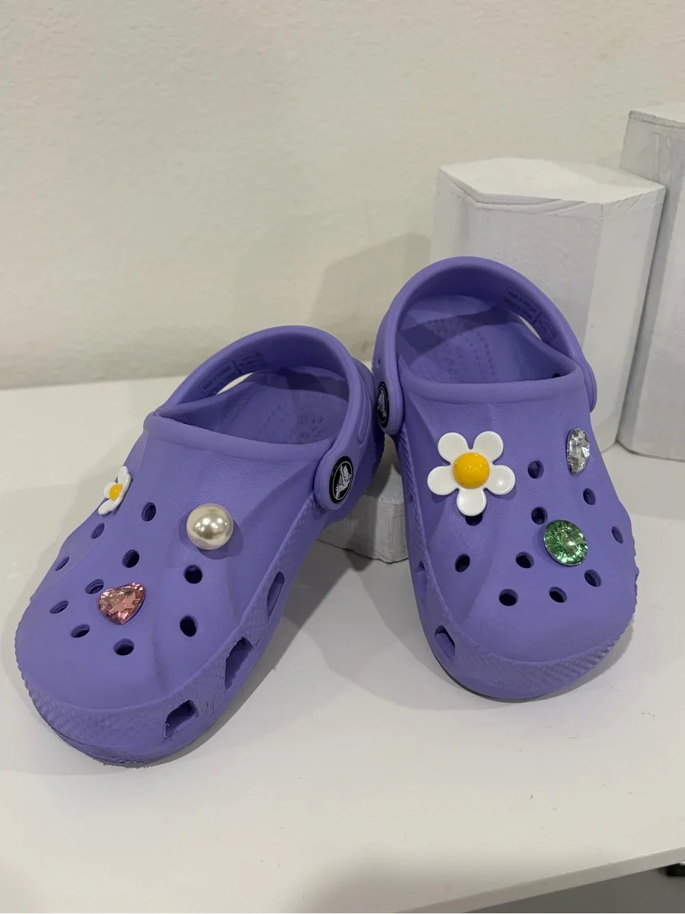 Girls size 9 toddler. Purple CROCS  Great Condition! Charms included